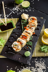 sushi on the black background