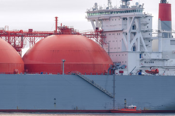 GAS CARRIER - A big ship and a small boat of pilots © Wojciech Wrzesień