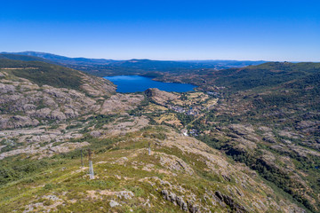 Aerial view of Sanabria lake and electric towers (Spain)