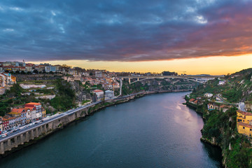 Fototapeta na wymiar Sunrise over Porto city and Vila Nova de gaia city (right), Portugal