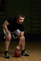 Naklejka premium Man trying lift weight