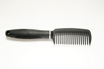 black comb on white background