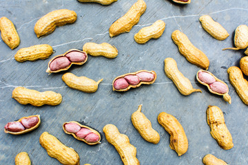 Opened peanuts pattern on the rock background