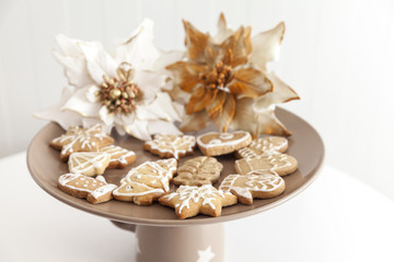 Fototapeta premium gingerbread cookies on a plate with Christmas motifs
