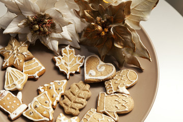 gingerbread cookies on a plate with Christmas motifs