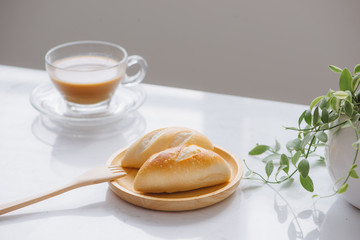 Morning breakfast with bread and coffee.