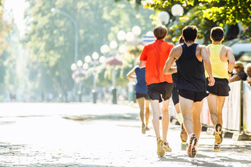  Athletes run in the park on the running marathon
