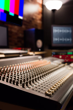 audio mixing console and studio equipment in recording, broadcasting, editing studio