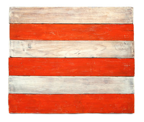 Grunge red white striped wood board isolated on white background. Surface of aged red white wooden planks, top view.