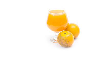 Orange juice in glass and ripe shogun orange isolated on white background.