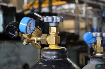 Professional machinist. Horizontal shot of a man operating lathe grinding machine metalworking industry concept copyspace.  Cropped shot of a industry worker at his workshop