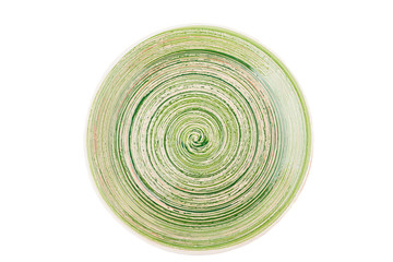 Green round ceramic plate with spiral pattern, isolated on white