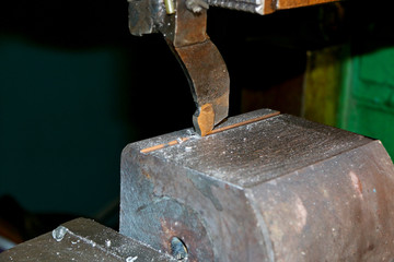 The CNC milling machine cutting the sample part with the flat endmill in light blue scene.The rough endmill cutter for CNC machine with lighting effect