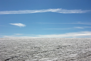 Fototapeta na wymiar Snow changing to a blue sky