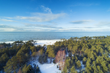 Snowy and icy Baltic sea coast next to Liepaja, Latvia.