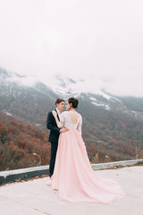 modern wedding in the mountains in Sochi and the sea, a wedding in a European style by car.