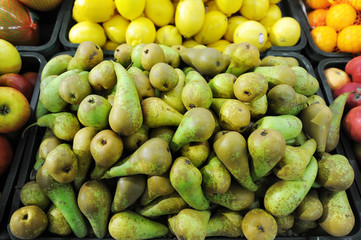 Green pears at a farmers market