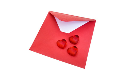 Red hearts and open envelope on the white background.