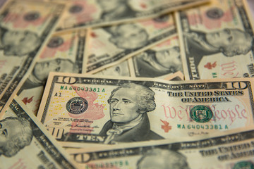 A Pile of Ten Dollar Bills as a Money Background