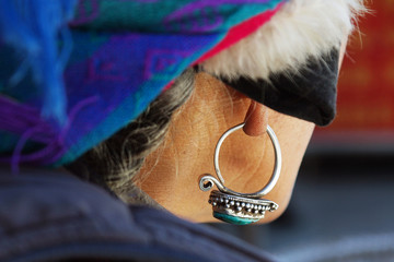 earring of ethnic woman 