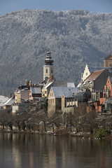 Fototapeta na wymiar cityscape frohnleiten on river mur in winter, styria, austria