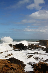 Furry of nature, waves crushing shore rocks
