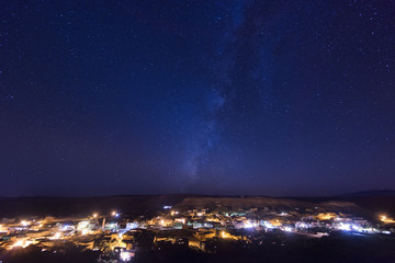 Night view from Ait Ben Haddou, Atlas mountains, Africa. Starry night sky.