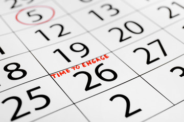 Calendar with written text TIME TO ENGAGE, closeup