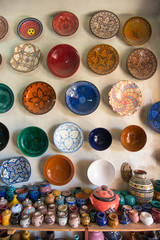 Traditional arabic handcrafted, colorful decorated ceramic for sale at the market in Marrakesh, Morocco, Africa