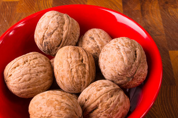 walnuts in red plate