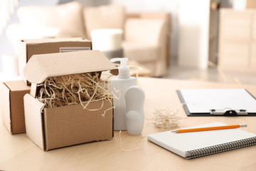 Preparing parcels for shipment to customer on table