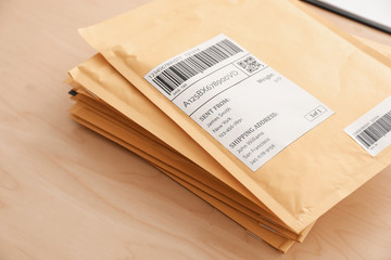 Preparing parcels for shipment to customer on table