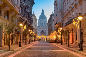 Zrínyi street in Budapest ending with St. Stephen's Basilica building