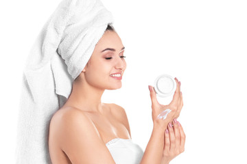 Obraz na płótnie Canvas Woman applying hand cream on white background