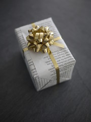 present  wrapped newspaper instead