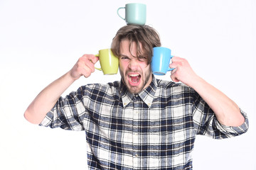 handsome guy holding cups isolated on white background