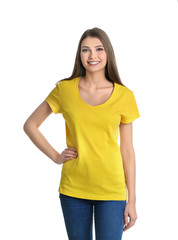 Obraz premium Young woman in yellow t-shirt on white background. Mockup for design