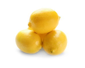 Fresh ripe lemons on white background
