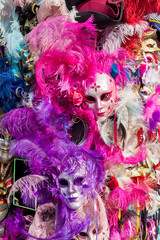Carnival masks with colorful feathers.