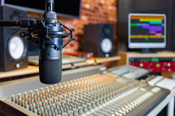 Naklejka premium condenser microphone in recording studio