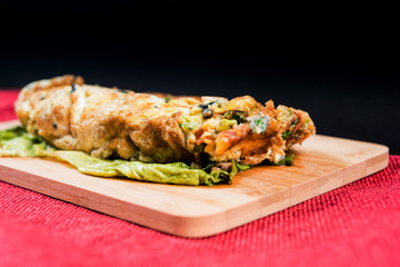 omelet with ham tomato and green salad