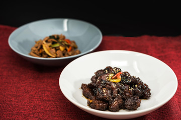 wok fried chicken stir fry with sweet peppers and chinese vegetables