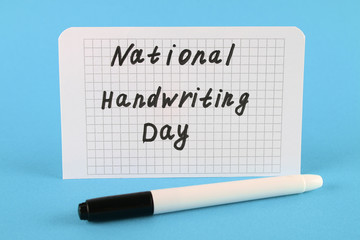 A note with an inscription is a national day of hand writing and a marker.
