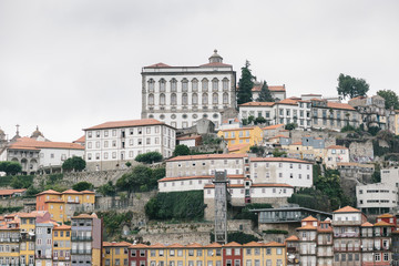 Fototapeta na wymiar Rooftops of old city of Porto in Portugal.