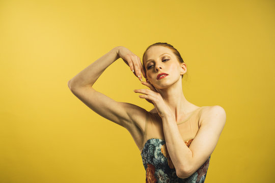Young woman dancing in studio