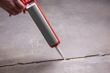  Sealant gun crack
covers the crack in the floor of the wall tile concrete
