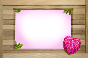 Decorating a postcard with a wooden frame with a floral heart