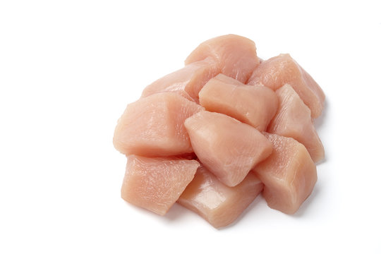 Medium-sized Raw Chicken Cubes Isolated On White Background