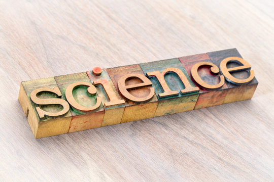 science word abstract in wood type