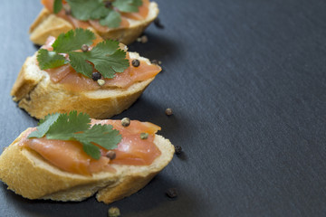 Baguette with salmon and parsley